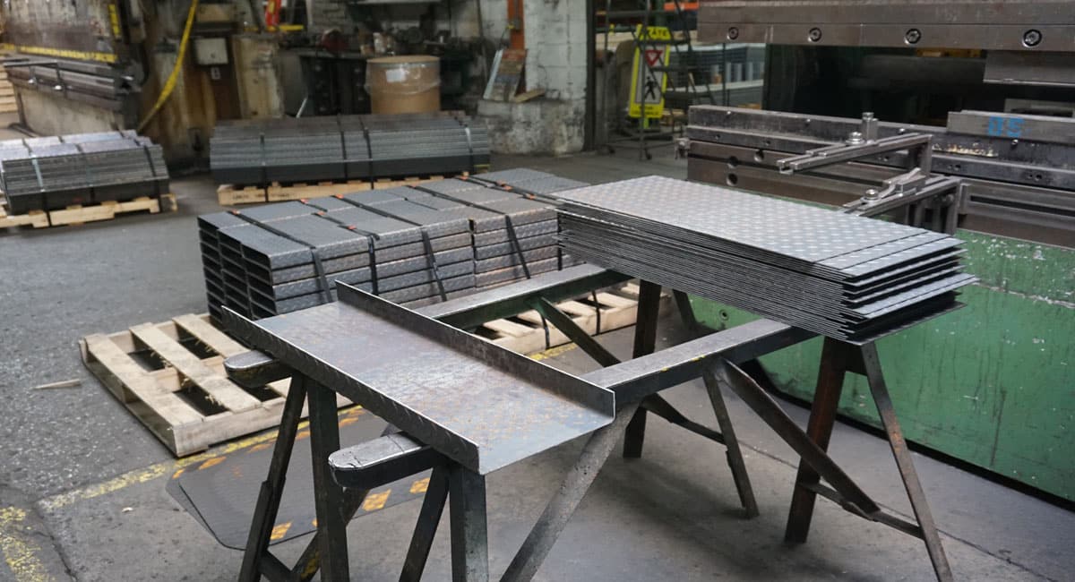 Fabrication of Metal Stair Treads | SCS | Stair Components & Systems | a division of Eberl Irons Works, Inc. | Buffalo, NY USA